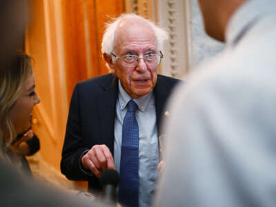 Sen. Bernie Sanders speaks to reporters outside the Senate Chamber at the U.S. Capitol in Washington, D.C., on April 23, 2024.
