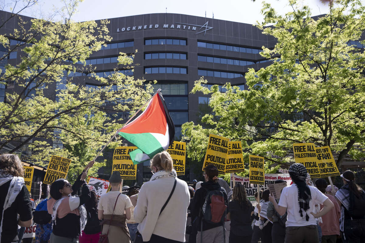 Pro-Palestine activists demonstrate after they shut down Lockheed Martin's headquarters entrance to demand an end to their weapons supply to Israel, in Arlington, Virginia, on April 15, 2024.