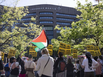 Pro-Palestine activists demonstrate after they shut down Lockheed Martin's headquarters entrance to demand an end to their weapons supply to Israel, in Arlington, Virginia, on April 15, 2024.