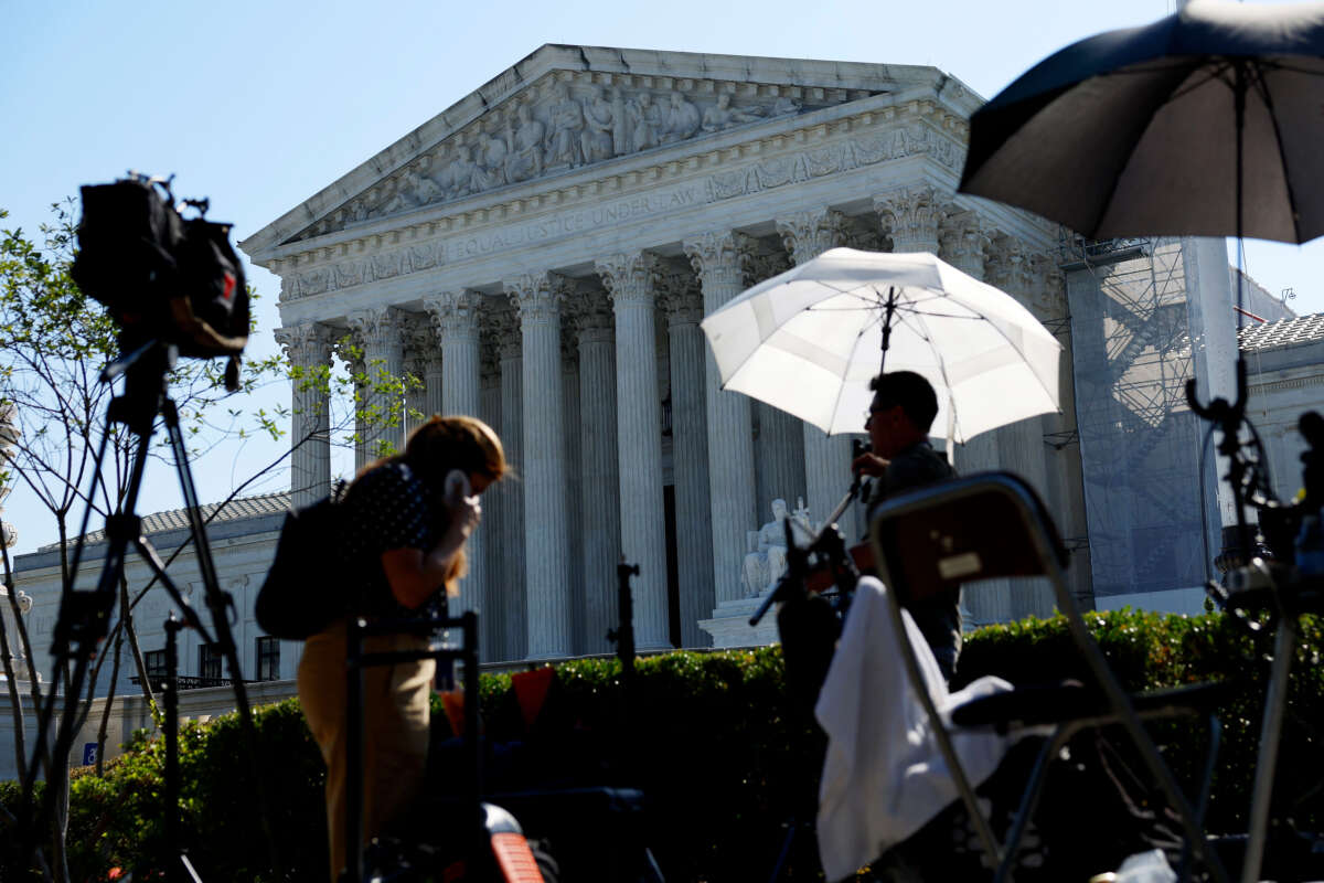 TV journalists work outside of the U.S. Supreme Court Building on June 14, 2024, in Washington, D.C.