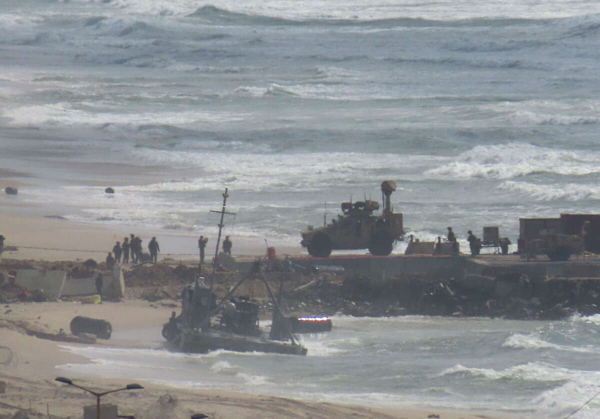 A view of a damaged floating pier, set up by the U.S. to facilitate quicker delivery of humanitarian aid to Palestinians, after it has been suspended due to adverse weather conditions and rising sea levels in Gaza City, Gaza, on May 27, 2024.