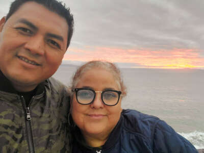 Luis Asencio Cordero and Sandra Muñoz are pictured by the beach.