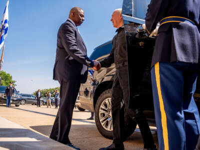 U.S. Secretary of Defense Lloyd Austin greets Israeli Defense Minister Yoav Gallant as he arrives during an honor cordon at the Pentagon on June 25, 2024, in Arlington, Virginia.