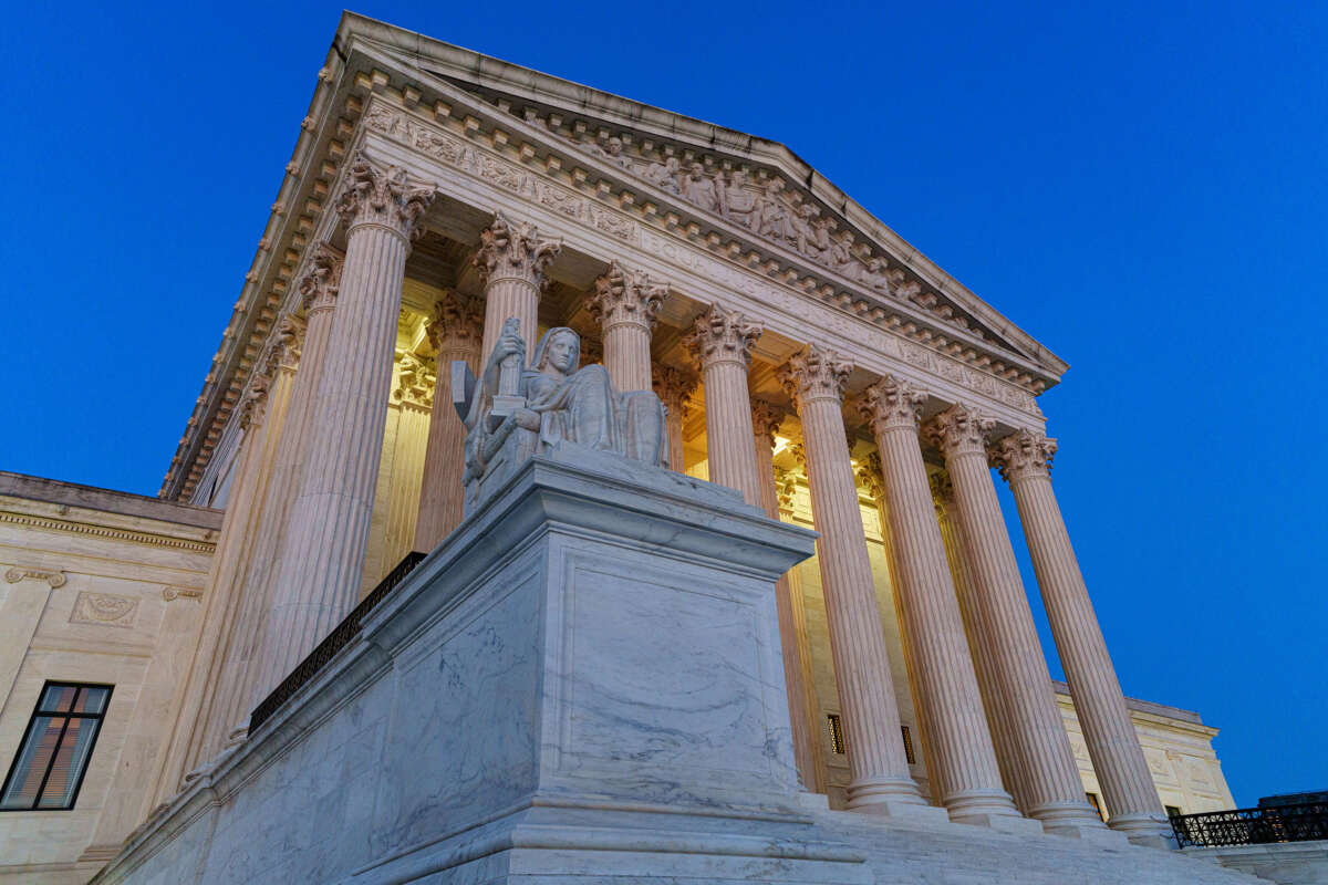 The front of the U.S. Supreme Court building is seen after sunset on June 24, 2024, in Washington, D.C.