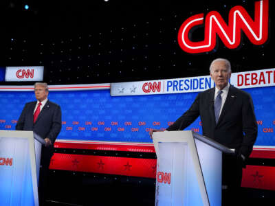 President Joe Biden (right) and former President Donald Trump participate in the CNN Presidential Debate at the CNN Studios on June 27, 2024, in Atlanta, Georgia.