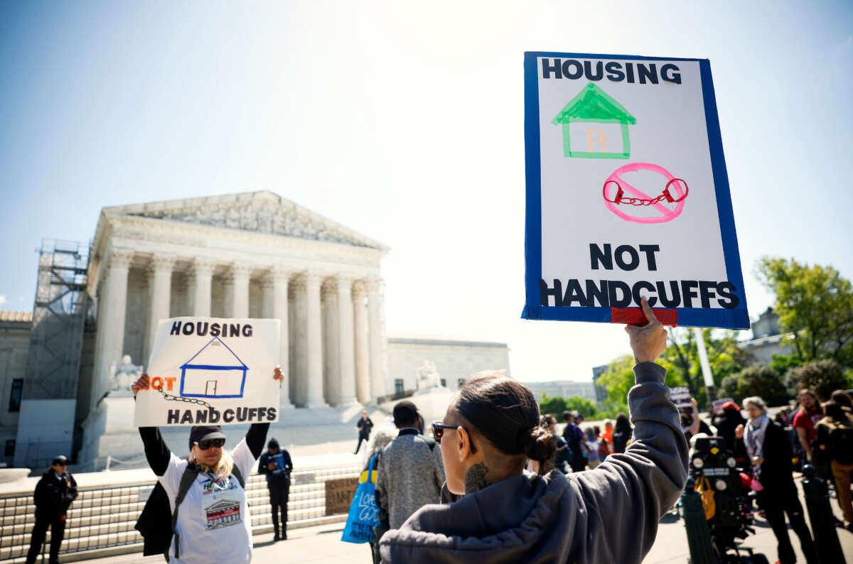Homeless rights activists hold a rally outside of the U.S. Supreme Court on April 22, 2024, in Washington, D.C.
