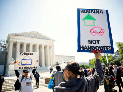 Homeless rights activists hold a rally outside of the U.S. Supreme Court on April 22, 2024, in Washington, D.C.