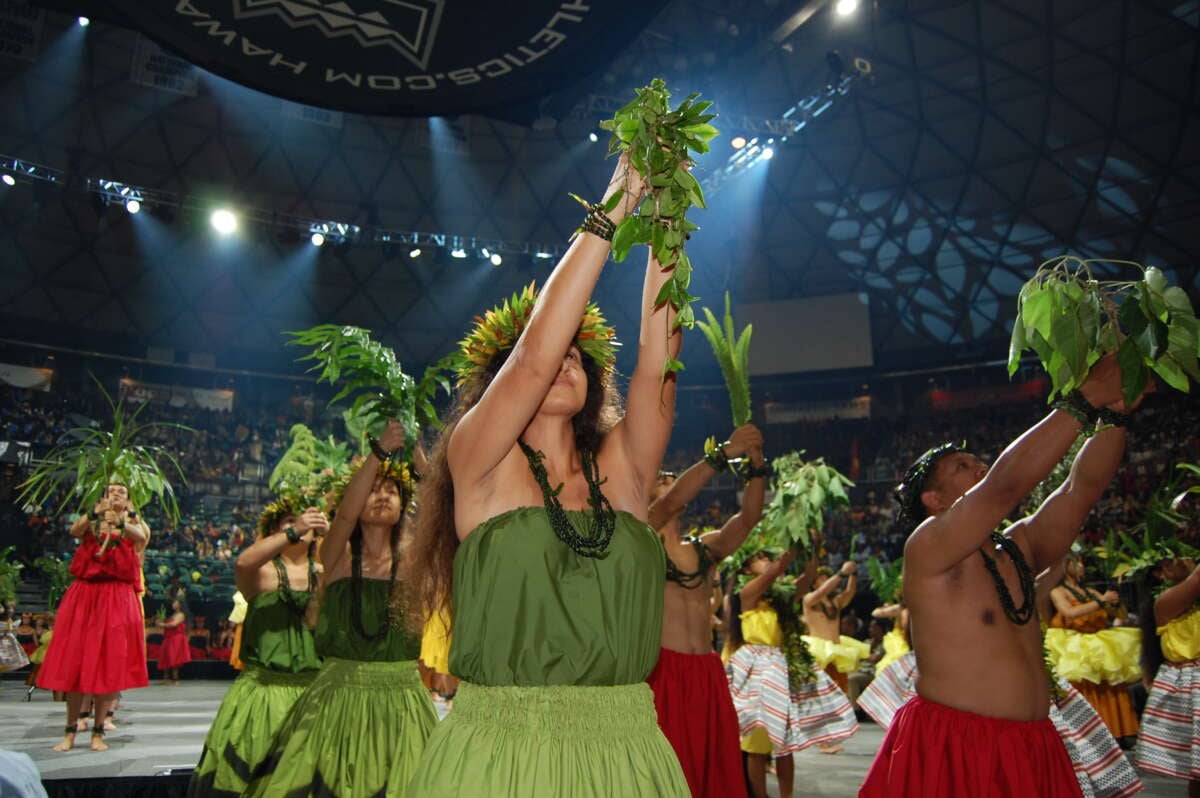 Hawaiian hula dancers join 24 other island delegations at the opening ceremony of the Festival of Pacific Arts & Culture. The eight-hour marathon of music and dance took place at the Stan Sheriff Center at the University of Hawaii at Manoa on June 6, 2024.