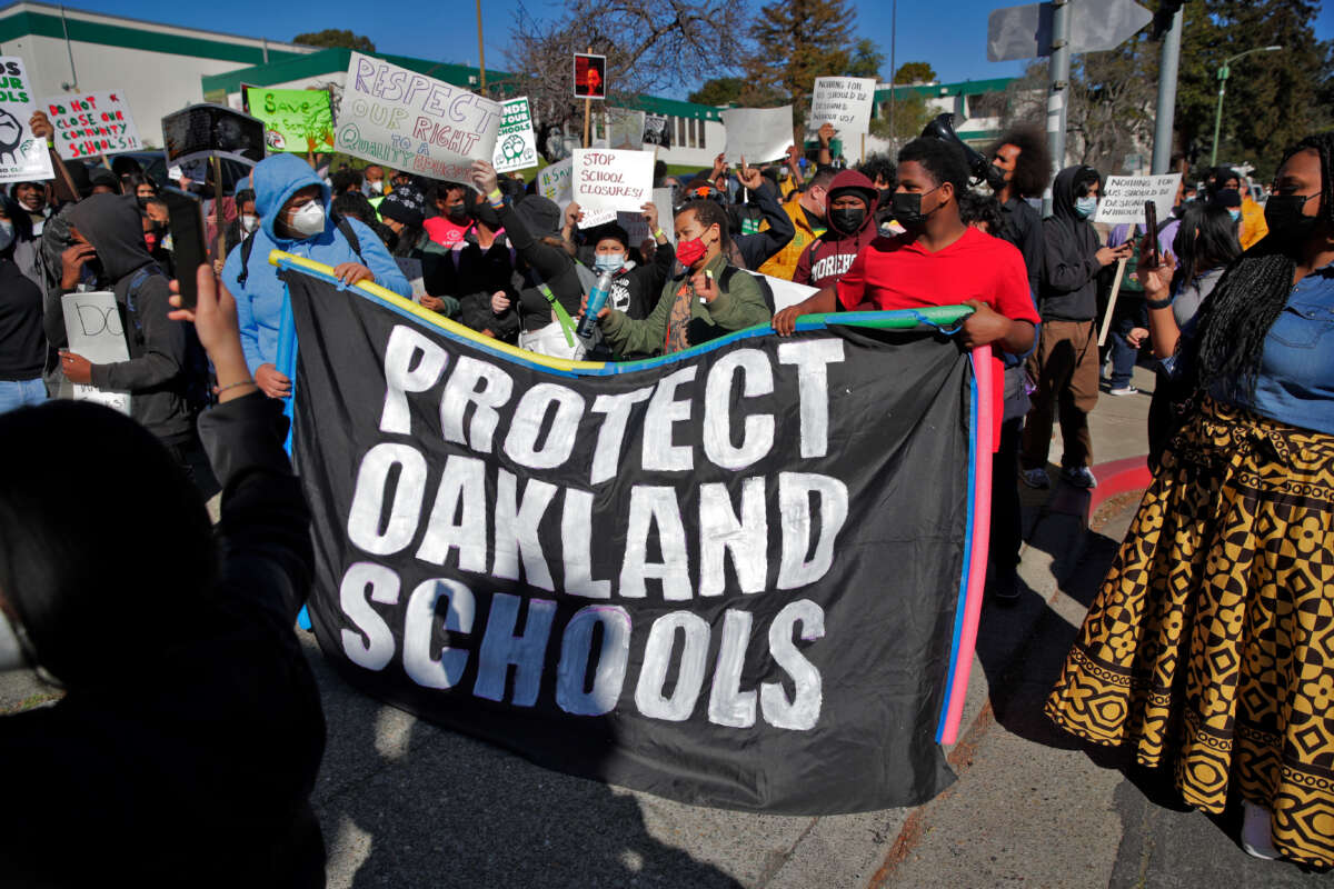 Students, teachers and parents walked out of Westlake Middle School and marched to Oakland Unified School District offices to protest its consideration for closure by the district in Oakland, California, on February 1, 2022.