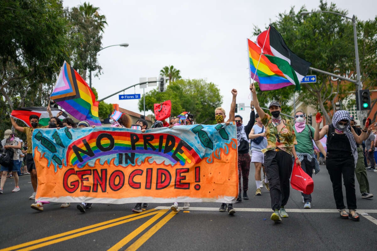 A group of marchers holds a banner that reads, "No Pride In Genocide" during the 2024 WeHo Pride Parade on June 2, 2024, in West Hollywood, California.