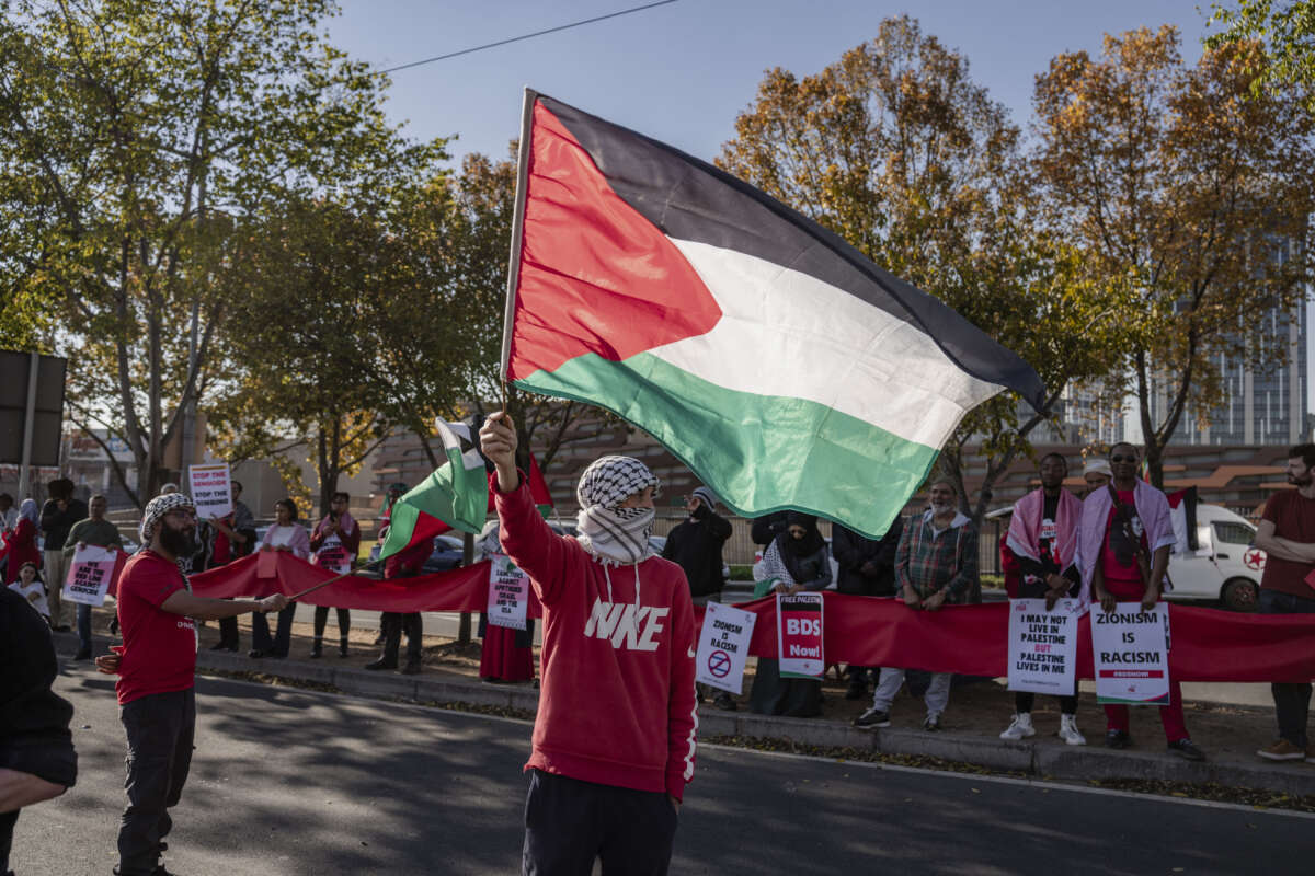 Dozens of people gather in front of the U.S. embassy to organize a demonstration in support of Palestinians in Johannesburg, South Africa, on June 15, 2024.