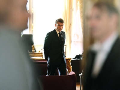 French President Emmanuel Macron waits for a bilateral meeting during the Global Forum for Vaccine Sovereignty and Innovation at the French Foreign Ministry on June 20, 2024, at the Quai d'Orsay, in Paris, France.