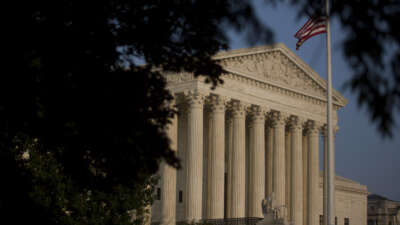 American flag flies next to the U.S. Supreme Court