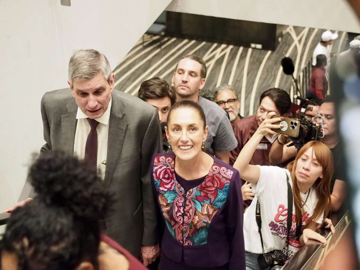 Accompanied by her husband Jesús María Tarriba, Mexican President-elect Claudia Sheinbaum Pardo arrives to address supporters and media outlets in Mexico City on June 3, 2024.