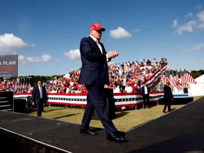 Former President Donald Trump walks offstage after giving remarks at a rally at Greenbrier Farms on June 28, 2024, in Chesapeake, Virginia.