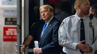 Former President Donald Trump arrives to the courthouse as the jury is scheduled to continue deliberations for his hush money trial at Manhattan Criminal Court on May 30, 2024, in New York City.