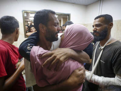 Palestinians are transported to al-Aqsa Martyrs Hospital after being released from more than seven months of detention by the Israeli army, in Deir al-Balah, Gaza, on July 1, 2024.
