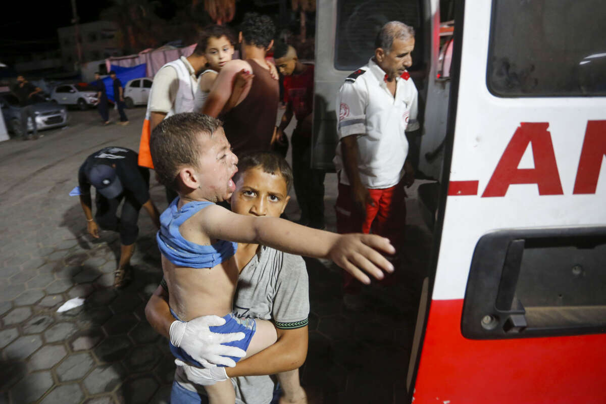 Injured Palestinians, including children, are brought to Al-Aqsa Martyr's Hospital for treatment after an Israeli army attack on July 9, 2024, in Deir Al Balah, Gaza.