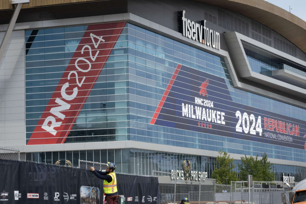 Workers prepare the area around the Fiserv Forum on July 10, 2024, in Milwaukee, Wisconsin. The Republican National Convention (RNC) will be held at the Forum on July 15-18.