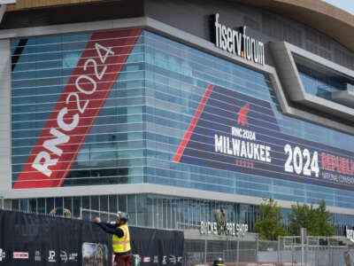 Workers prepare the area around the Fiserv Forum on July 10, 2024, in Milwaukee, Wisconsin. The Republican National Convention (RNC) will be held at the Forum on July 15-18.