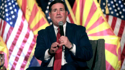 Arizona Gov. Doug Ducey speaks at an Arizona Chamber of Commerce & Industry event in Scottsdale, Arizona, on December 1, 2022.