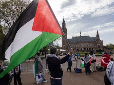 Demonstrators gather outside the Peace Palace, home of the International Court of Justice, to demand a ceasefire and show support for Palestine and Nicarague, in The Hague, Netherlands, on April 30, 2024.