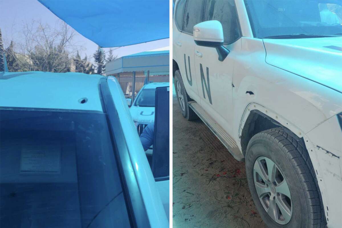 Marked UNICEF vehicles are pictured after being hit with live ammunition while waiting at a designated holding point near the Wadi Gaza checkpoint