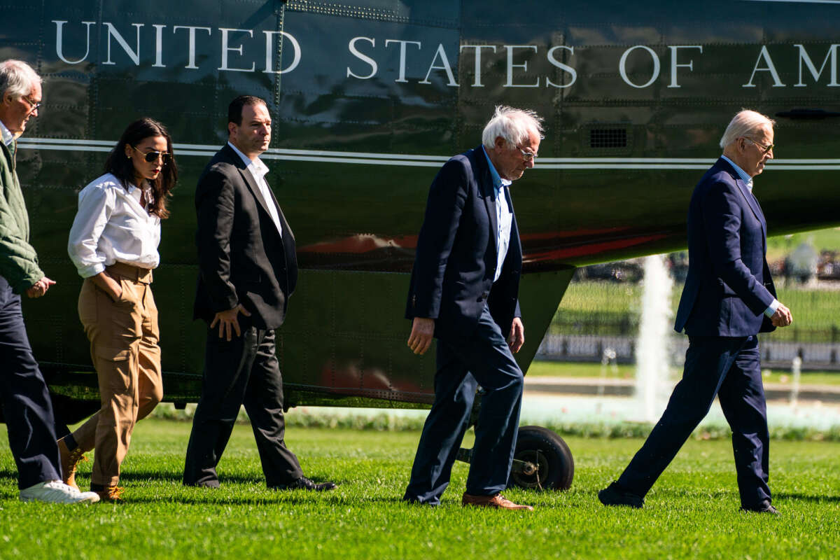 President Joe Biden, Sen. Bernie Sanders, Rep. Alexandria Ocasio-Cortez and Sen. Ed Markey walk across the South Lawn to the Oval Office of the White House on April 22, 2024.