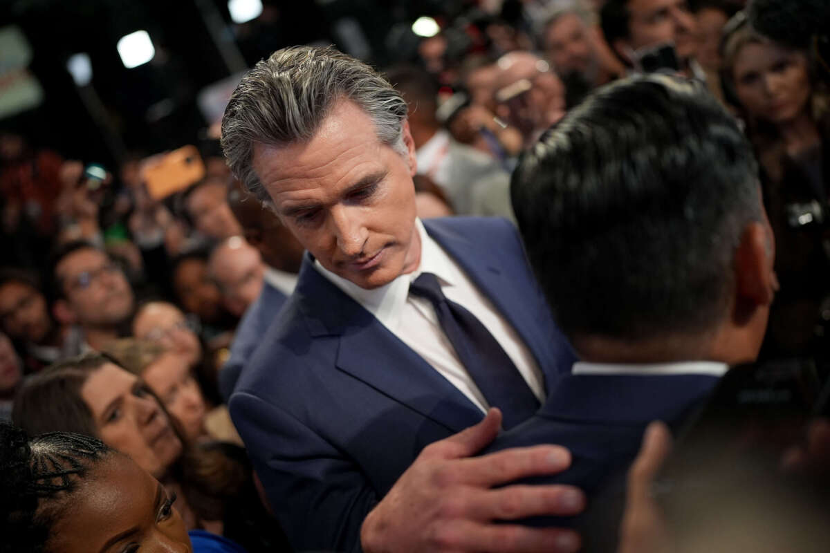 California Gov. Gavin Newsom speaks to reporters in the spin room following the CNN Presidential Debate between President Joe Biden and former President Donald Trump at the McCamish Pavilion on the Georgia Institute of Technology campus on June 27, 2024, in Atlanta, Georgia.