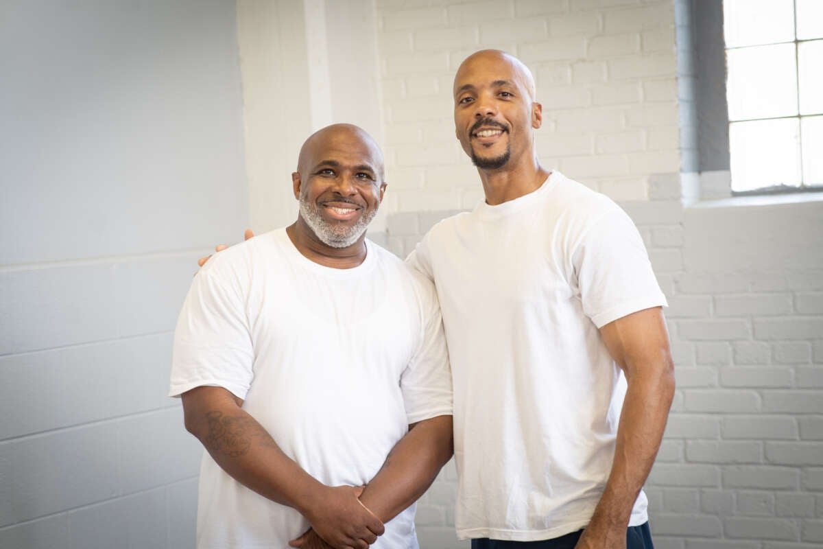 Michael Broadway, who died on June 19 at Stateville Correctional Center, excelled at educating himself in prison, graduating with a degree from Northwestern University. In this photo, taken at Stateville’s study hall in summer 2022, Broadway (left) stands with fellow student Michael Simmons.