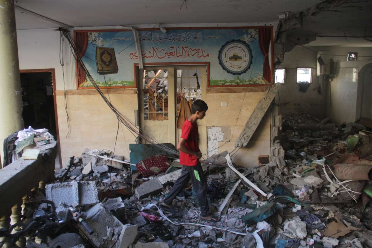 Palestinians inspect the destruction following the Israeli attack on the al-Tabin school, where displaced people took shelter, in al-Daraj neighborhood of Gaza City, Gaza on August 10, 2024.