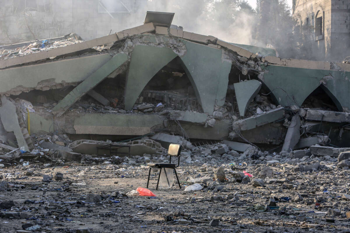 Palestinian living in the area inspect the rubbles of the destroyed school building following an Israeli attack on Haditha School, in Deir al-Balah, Gaza, on July 28, 2024.