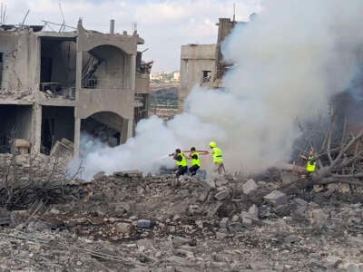 Lebanese civil defence workers extinguish a fire following an Israeli air raid on the town of Shamaa (Chamaa) in southern Lebanon on August 1, 2024, amid ongoing cross-border clashes between Israeli troops and Hezbollah fighters.
