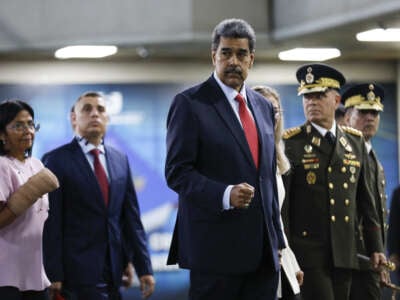 Venezuelan President Nicolas Maduro delivers a document to Venezuela's Supreme Court following Sunday's presidential elections and makes a statement to the press in Caracas, Venezuela, on July 31, 2024.