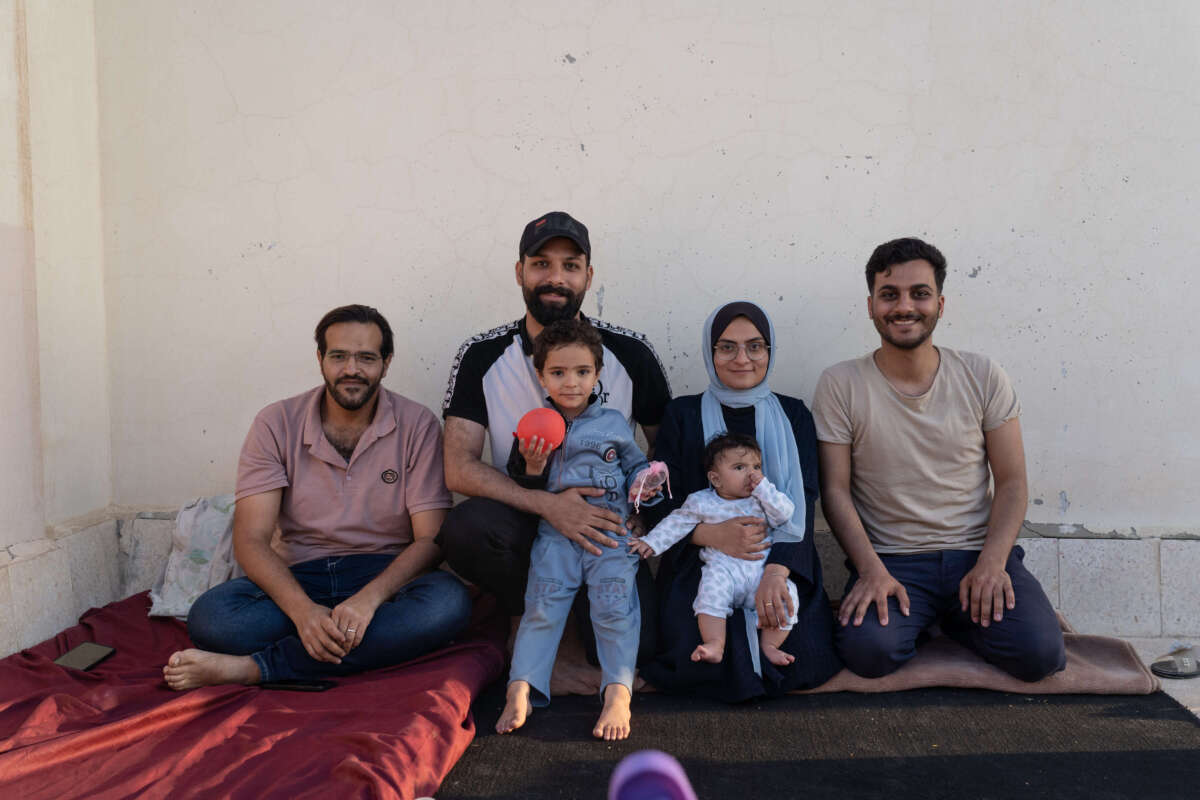 Hashim with her children, husband, and brothers.