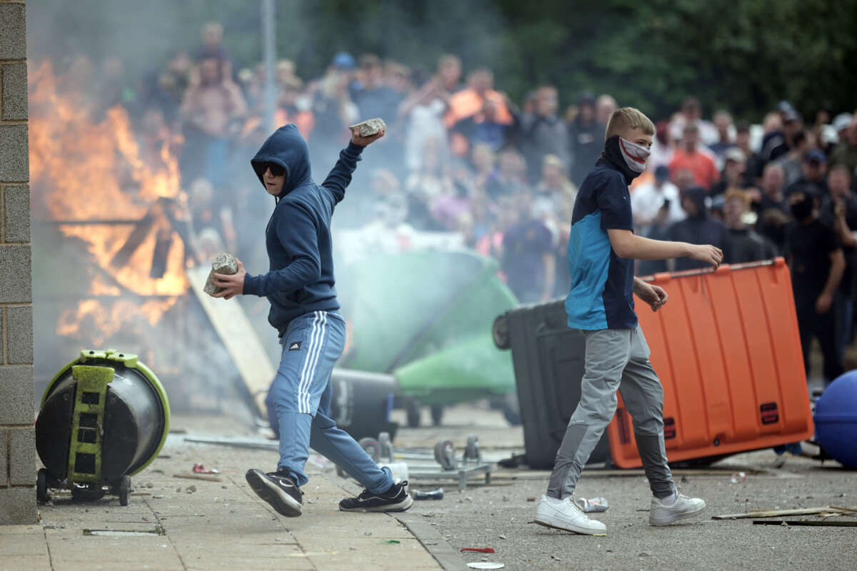 Anti-migration protesters riot outside of the Holiday Inn Express in Manvers, which is being used as an asylum hotel, on August 4, 2024, in Rotherham, United Kingdom.