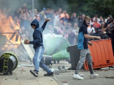 Anti-migration protesters riot outside of the Holiday Inn Express in Manvers, which is being used as an asylum hotel, on August 4, 2024, in Rotherham, United Kingdom.