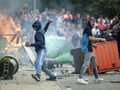 On August 4, 2024, in Rotherham, UK, anti-immigration rioters riot outside the Holiday Inn Express in Manvers, which is used as an asylum hotel.