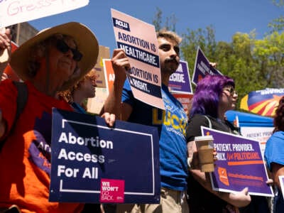 Members of Arizona for Abortion Access, the ballot initiative to enshrine abortion rights in the Arizona State Constitution, hold a press conference and protest at the Arizona House of Representatives on April 17, 2024, in Phoenix, Arizona.