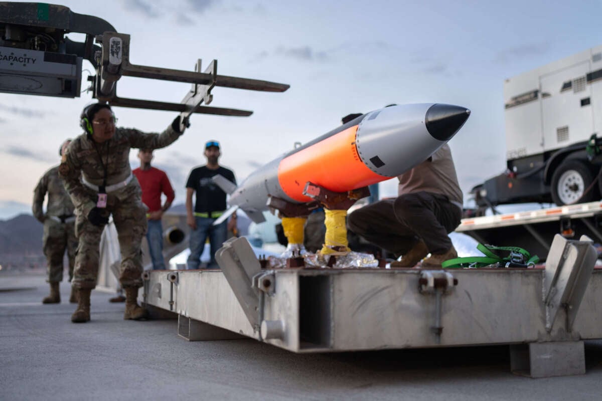 An inert B61-12 nuclear gravity bomb is prepared for testing at Nellis Air Force Base.