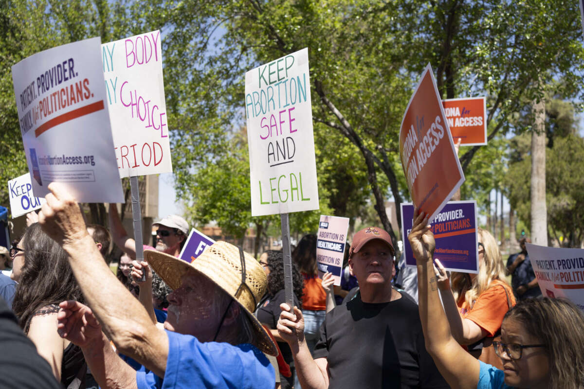 Members of Arizona for Abortion Access, the ballot initiative to enshrine abortion rights in the Arizona State Constitution, hold a press conference at the Arizona House of Representatives on April 17, 2024, in Phoenix, Arizona.