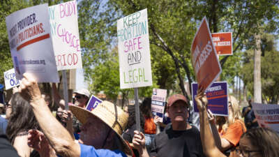 Members of Arizona for Abortion Access, the ballot initiative to enshrine abortion rights in the Arizona State Constitution, hold a press conference at the Arizona House of Representatives on April 17, 2024, in Phoenix, Arizona.