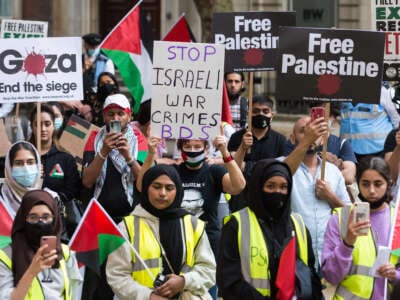 Students and pro-Palestinian supporters gather outside the Student Central building at the University of London to take part in a protest calling for U.K. universities to stop investing and cooperating with companies and institutions involved in breaches of international law carried out by the Israeli government in the Palestine, in London, United Kingdom, on July 9, 2021.