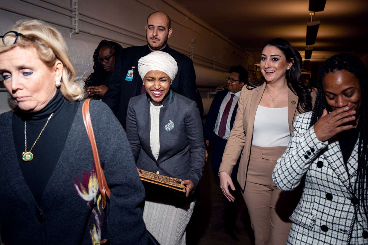 Ilhan Omar is led through the catacombs beneath the capitol and giggles alongside others