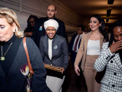 Ilhan Omar is led through the catacombs beneath the capitol and giggles alongside others