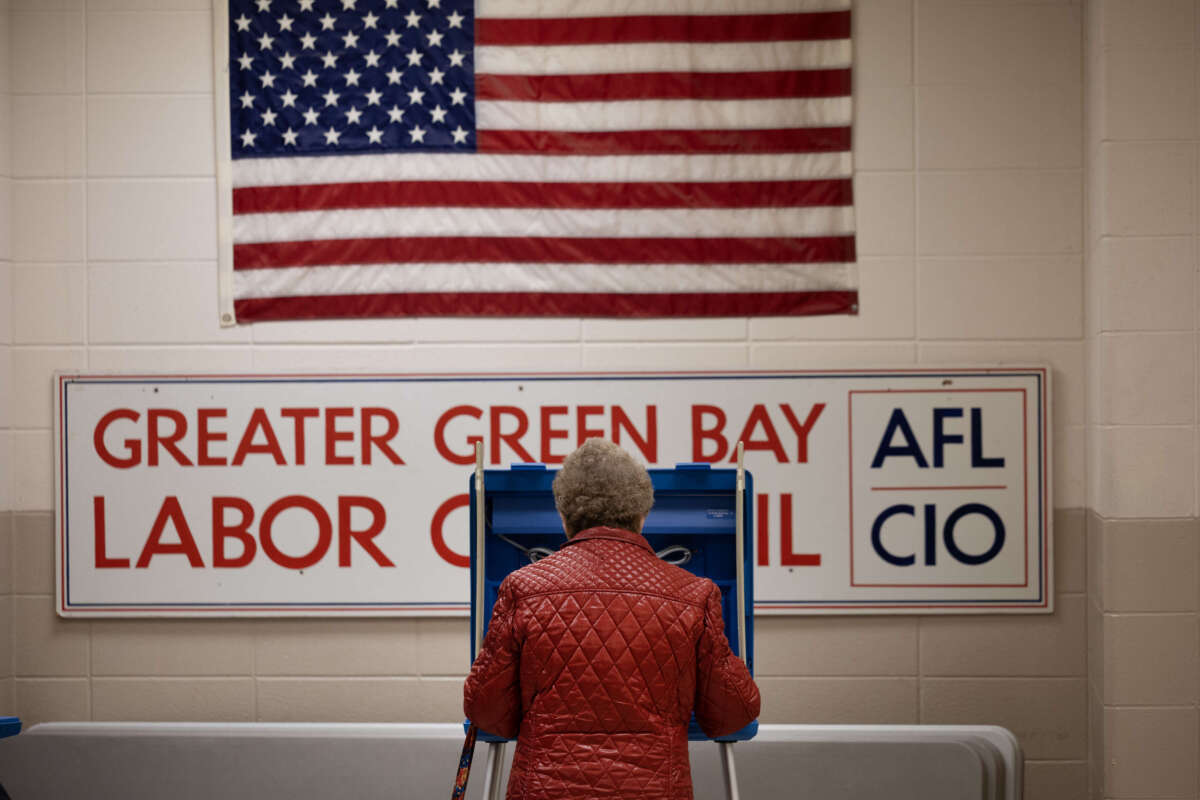 A resident casts their ballot in the state's primary election at a polling location on April 2, 2024, in Green Bay, Wisconsin.