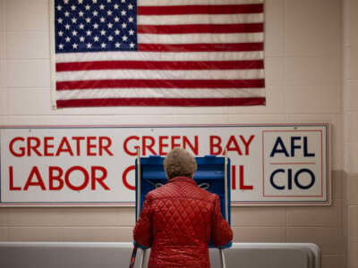 A resident casts their ballot in the state's primary election at a polling location on April 2, 2024, in Green Bay, Wisconsin.