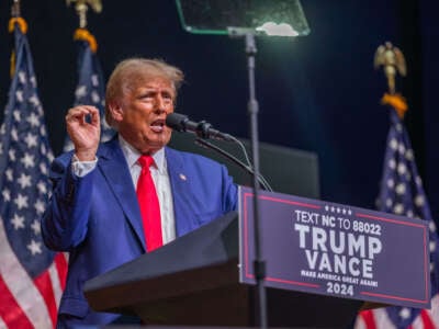 Former President Donald Trump speaks at a campaign event at Harrah's Cherokee Center on August 14, 2024, in Asheville, North Carolina.