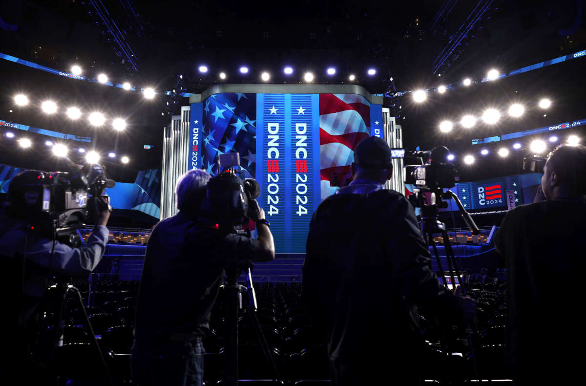 Members of the media attend the stage unveiling ahead of the Democratic National Convention at the United Center on August 15, 2024, in Chicago, Illinois.