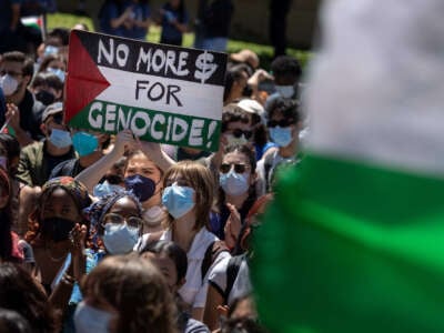 Pro-Palestinian demonstrators hold a student-faculty rally at Dickson Plaza at an encampment on the UCLA campus on April 29, 2024, in Los Angeles, California.